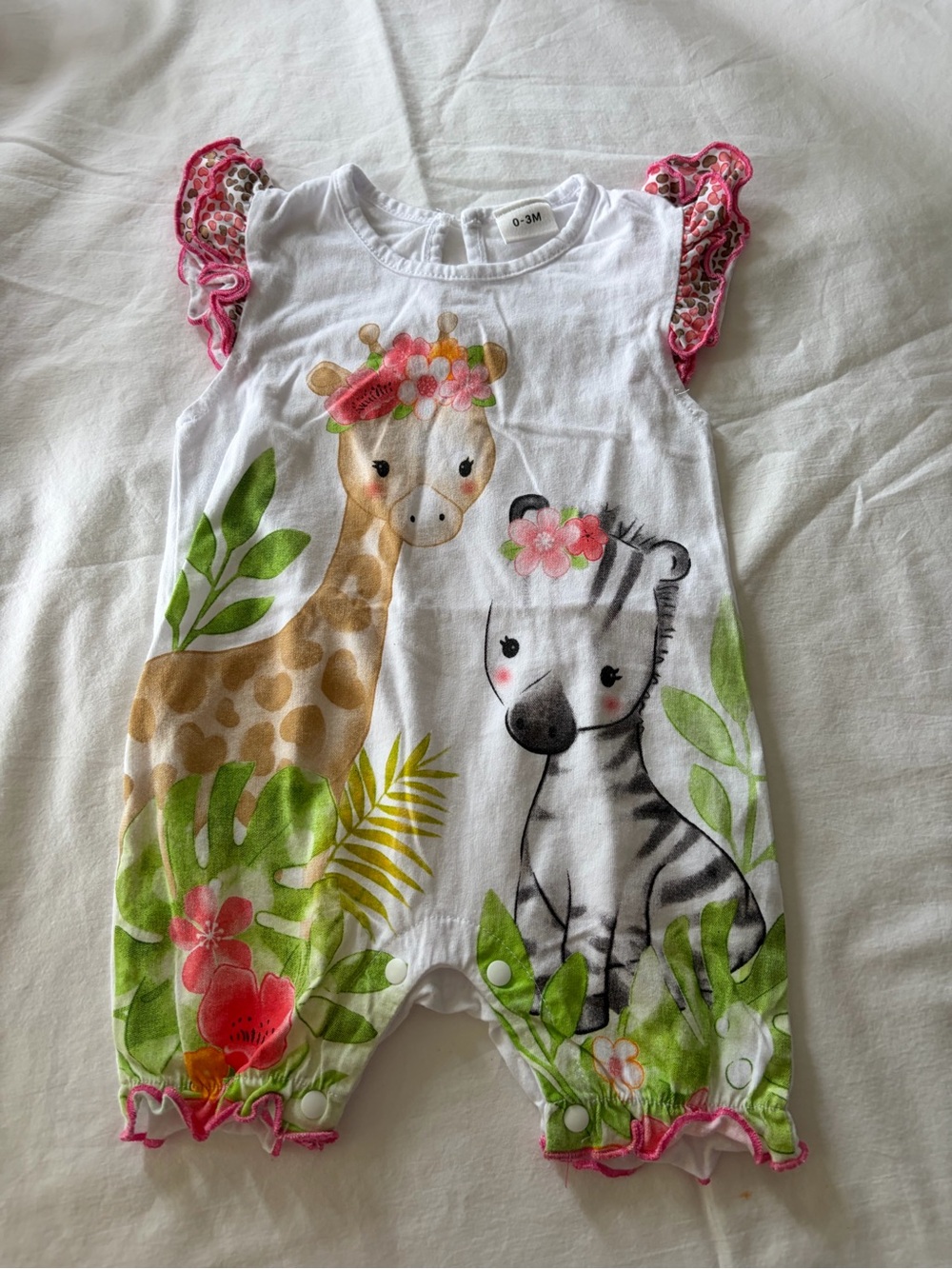 Onepiece White Baby Bodysuit with Pink Trim and Green Accents